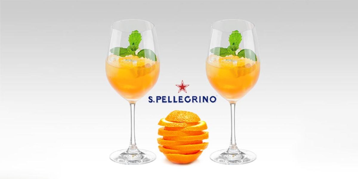 Zwei Gläser mit Orangencocktails und Minze, fotografiert für eine Werbeaktion von S.Pellegrino, durchgeführt von unserer Marketingagentur in Odelzhausen.