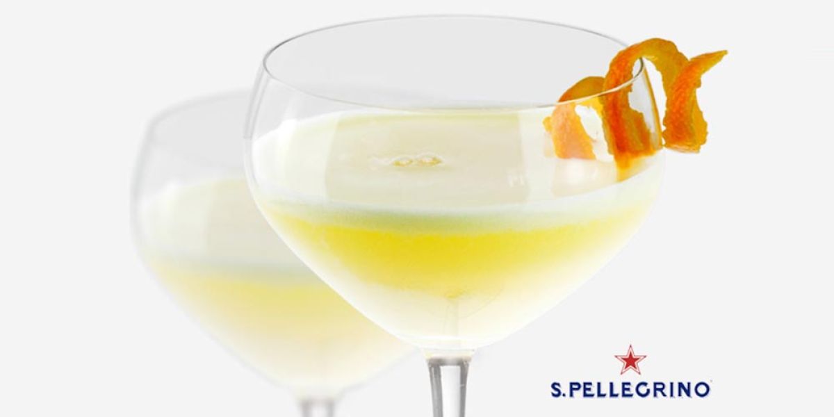Cocktail mit Orangenzeste, aufgenommen bei einem Fotoshooting für S.Pellegrino, durchgeführt von unserer Marketingagentur in Dachau.. Cocktail mit Orangenzeste, aufgenommen bei einem Fotoshooting für S.Pellegrino, durchgeführt von unserer Marketingagentur in Dachau..